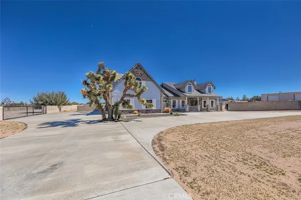 a view of a street with a building in the background