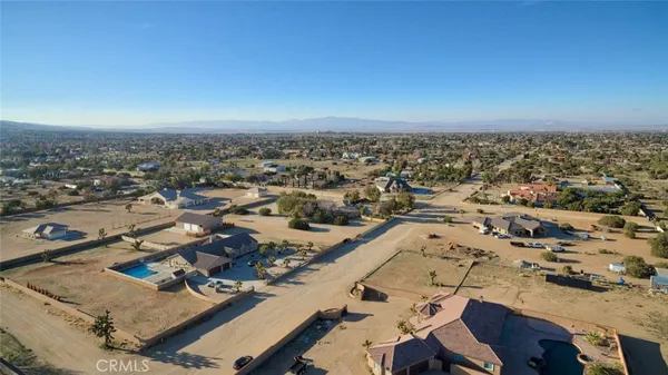 a bathroom with a sink double vanity and a mirror