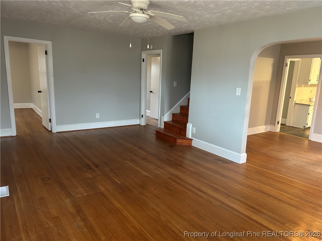 1700 Cedar Creek Road Fayetteville, NC 28312 - Photo 20 of 31 an empty room with wooden floor and windows