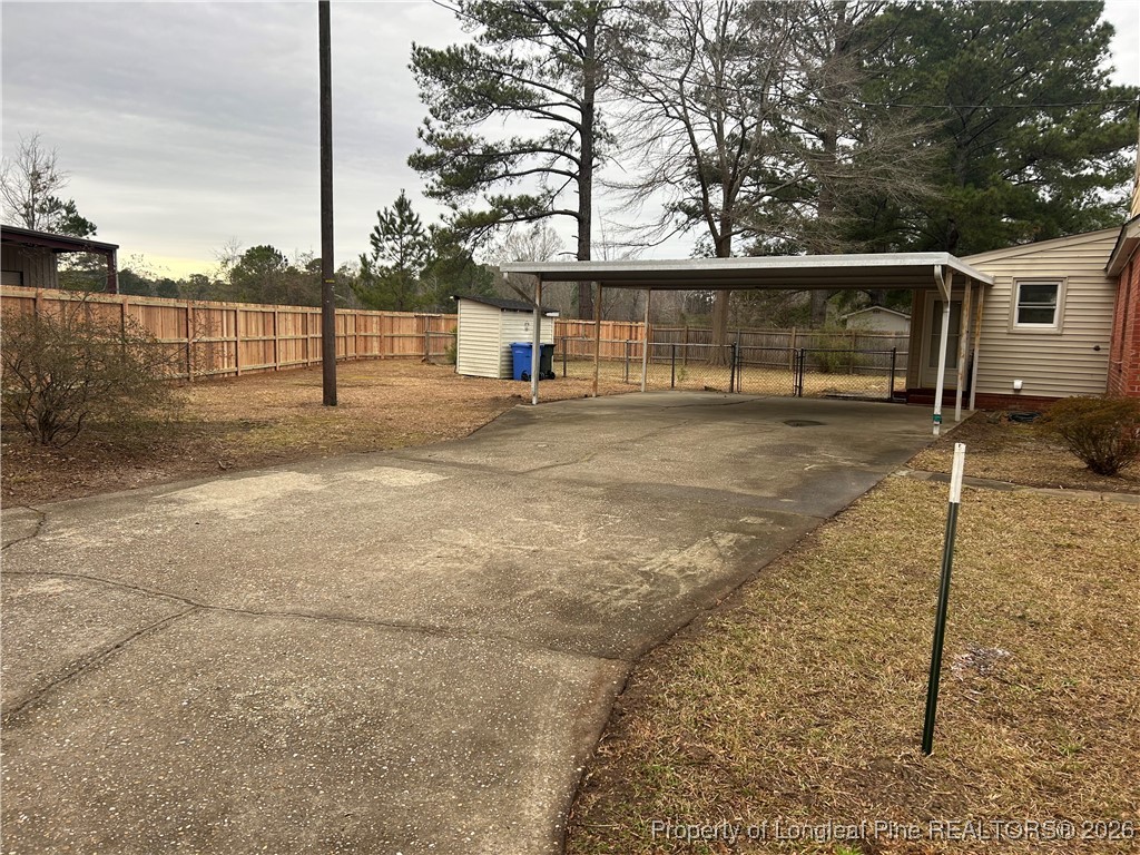 1700 Cedar Creek Road Fayetteville, NC 28312 - Photo 5 of 31 a view of backyard with large trees