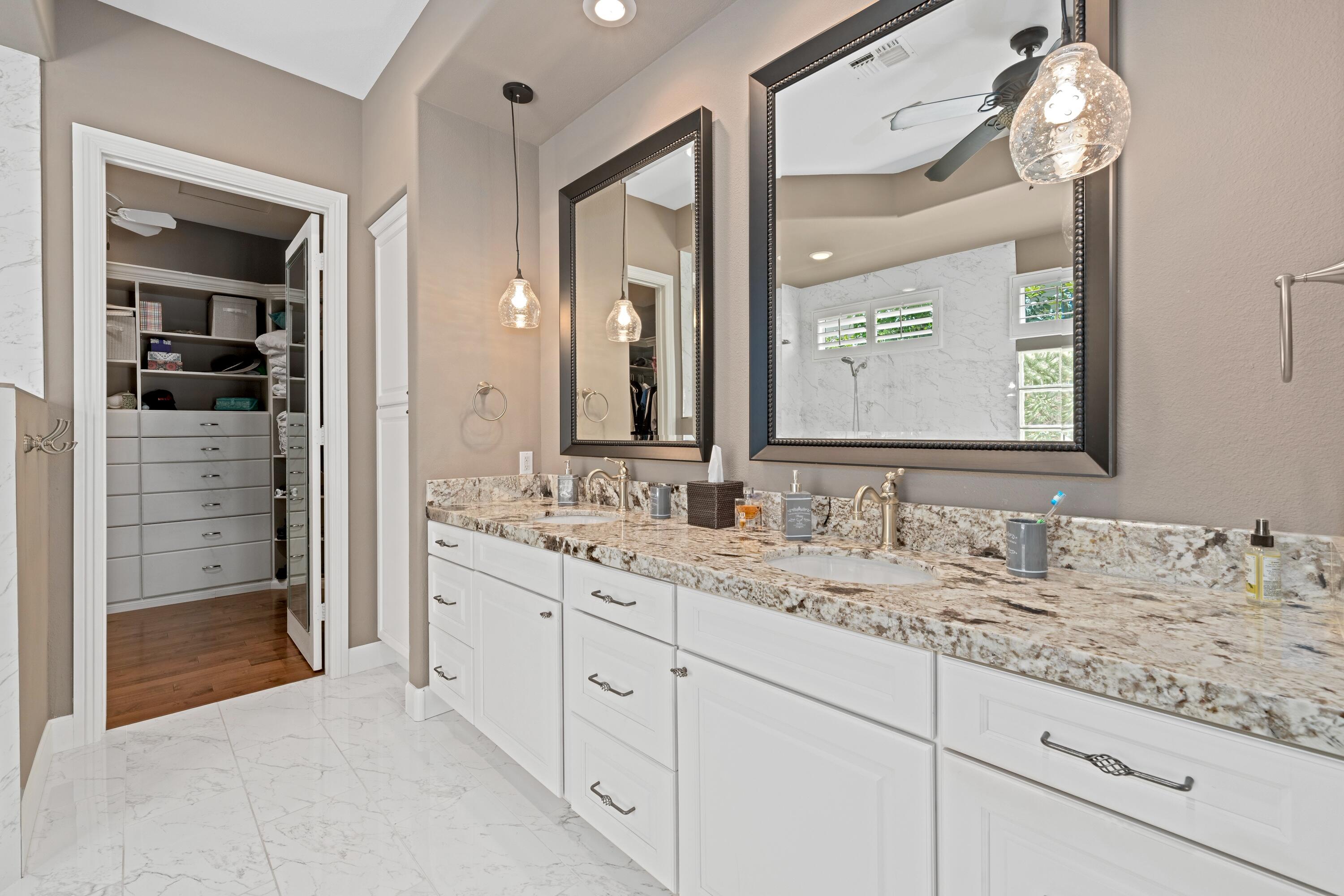 39623 Manorgate Road Palm Desert, CA 92211 - Photo 30 of 42 a bathroom with a sink double vanity and a mirror