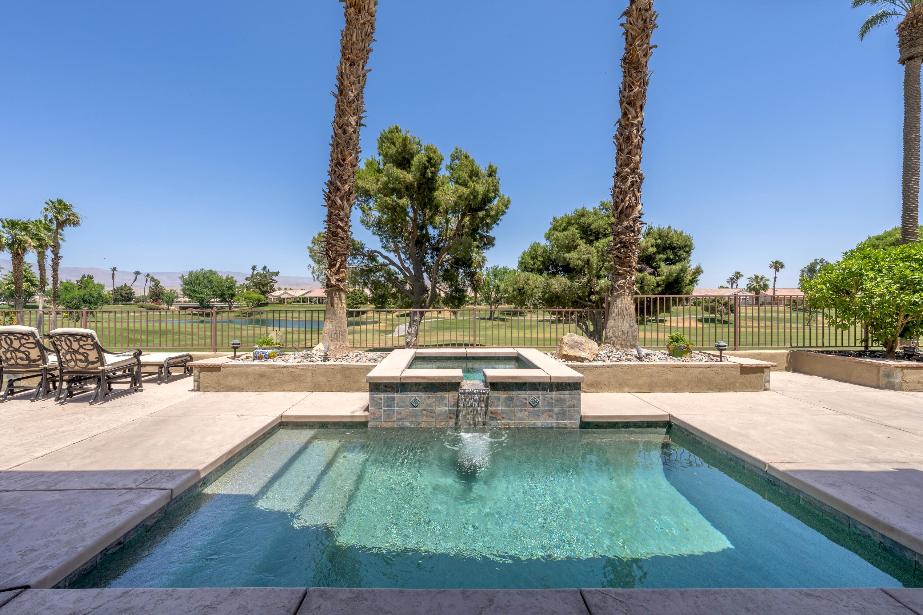 39623 Manorgate Road Palm Desert, CA 92211 - Photo 3 of 42 a view of swimming pool with outdoor seating and plants
