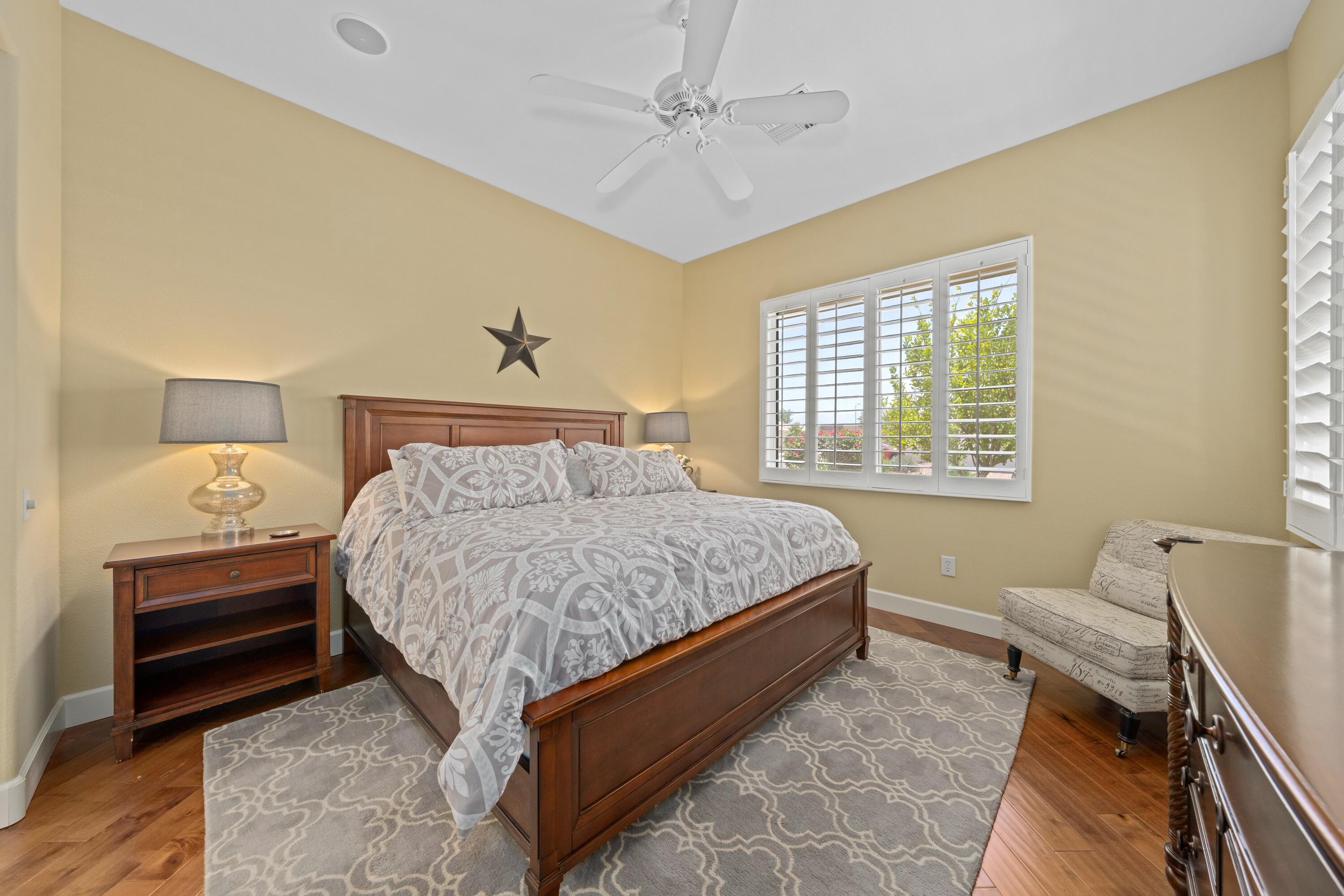 39623 Manorgate Road Palm Desert, CA 92211 - Photo 32 of 42 a bedroom with a bed and a window