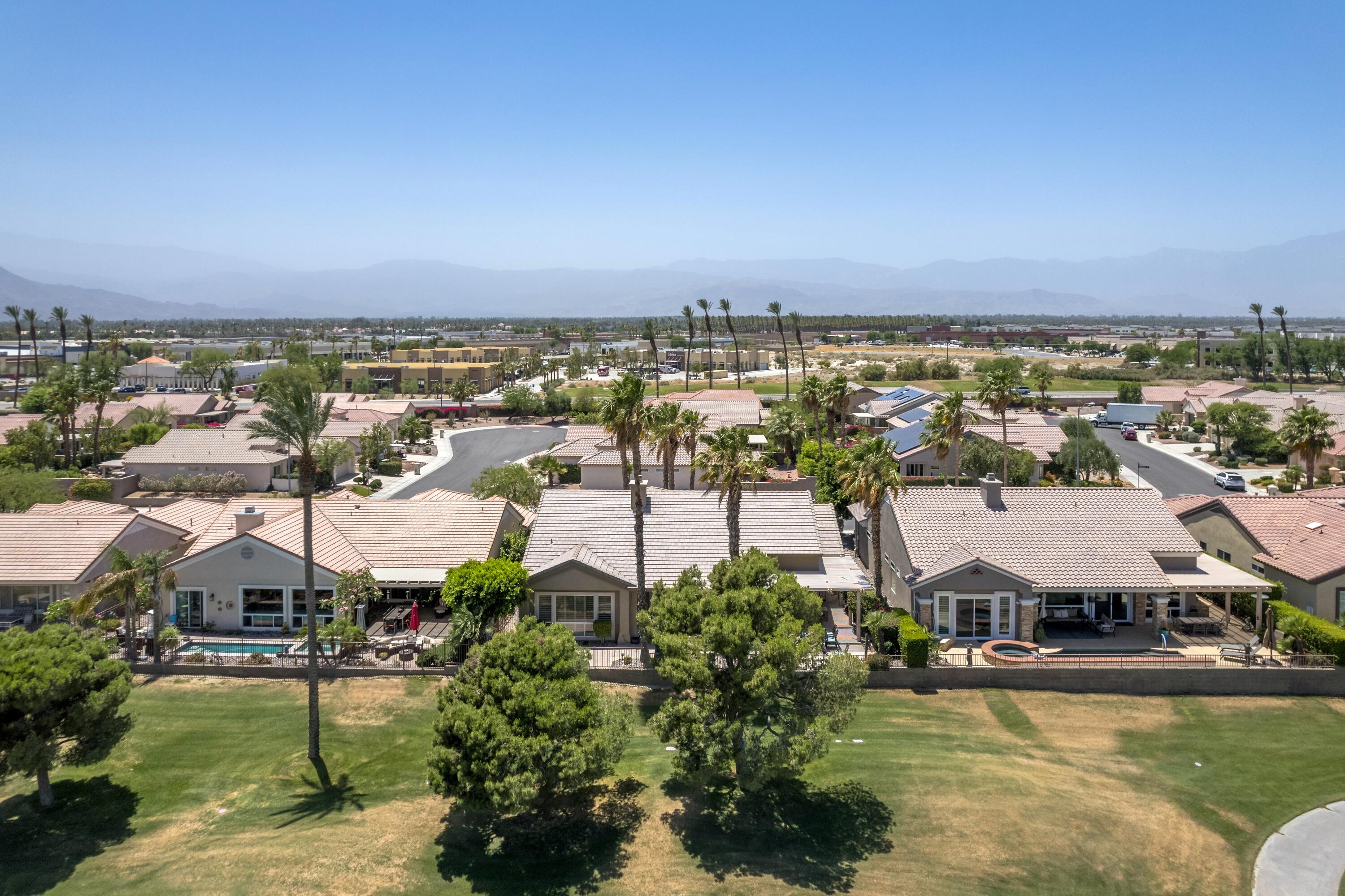 39623 Manorgate Road Palm Desert, CA 92211 - Photo 40 of 42 an aerial view of residential houses with outdoor space and swimming pool