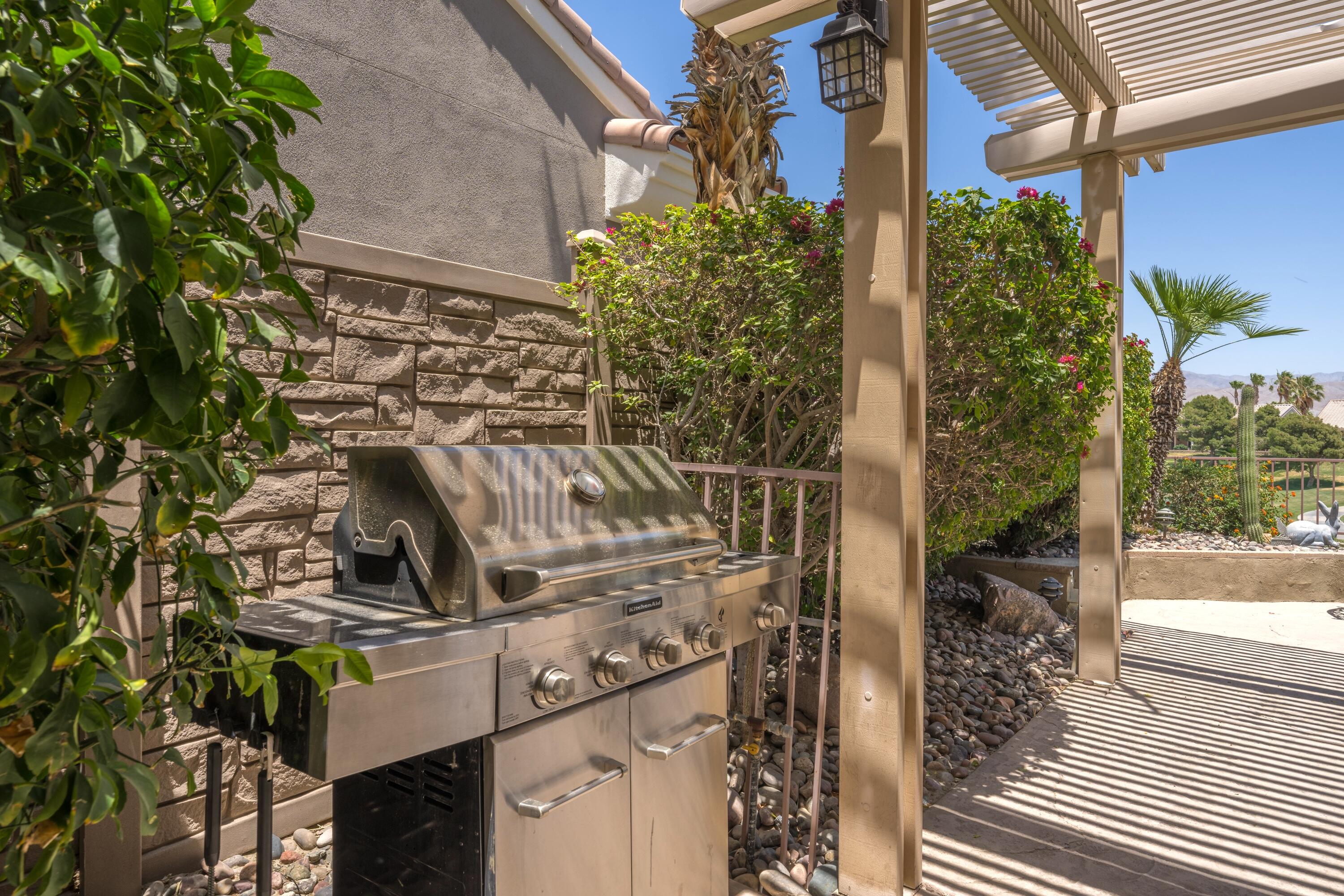 39623 Manorgate Road Palm Desert, CA 92211 - Photo 9 of 42 a view of a house with a street