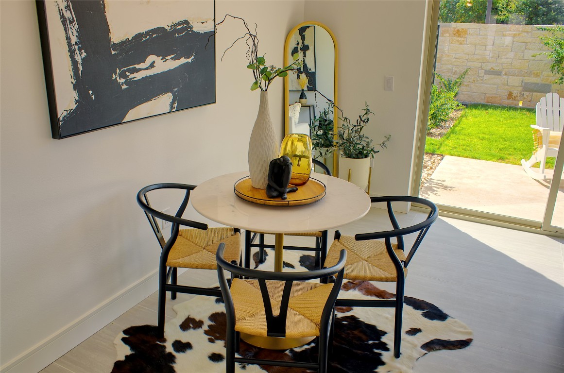 304 Tesla Circle Austin, TX 78681 - Photo 11 of 38 Dining space with baseboards