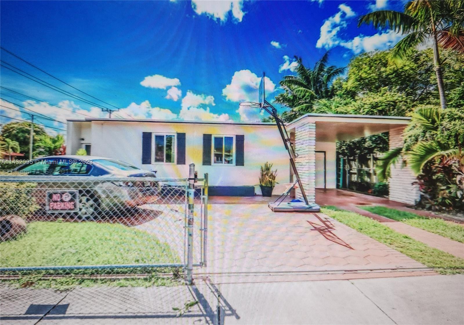 3101 Southwest 18th Street Miami, FL 33145 - Photo 2 of 11 a front view of house with yard