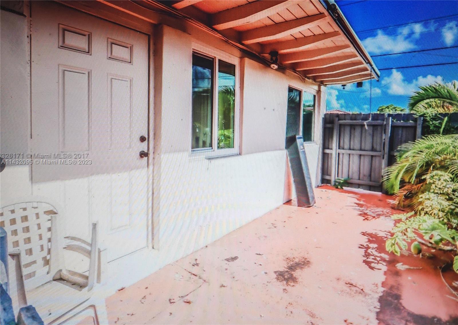 3101 Southwest 18th Street Miami, FL 33145 - Photo 6 of 11 a view of a backyard with potted plants
