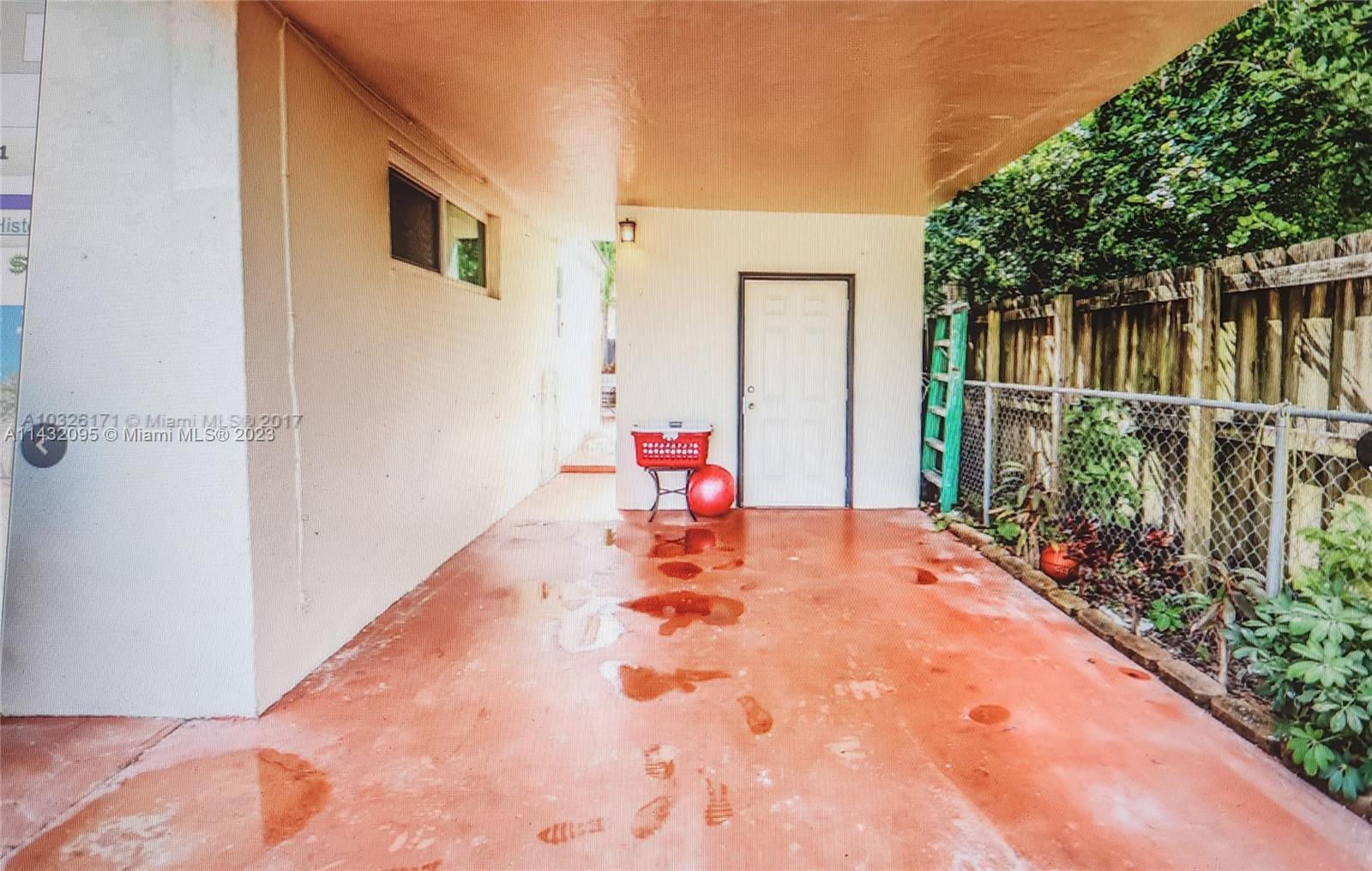 3101 Southwest 18th Street Miami, FL 33145 - Photo 7 of 11 a backyard of a house with table and chairs