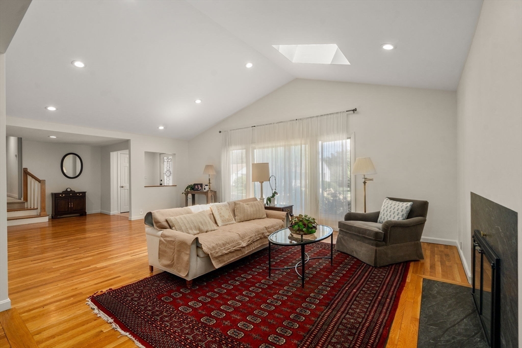 50 Mary Ellen Road Newton, MA 02468 - Photo 7 of 22 a living room with furniture and a rug