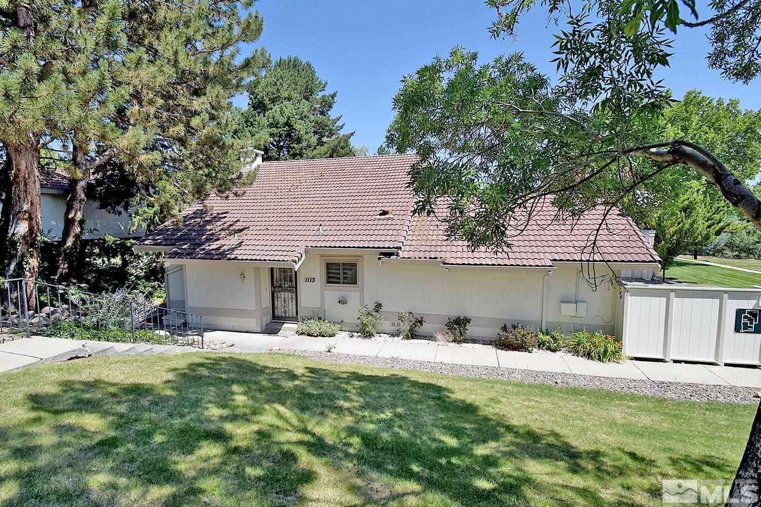 1113 Frontier Court Reno, NV 89503 - Photo 2 of 40 a front view of a house with garden