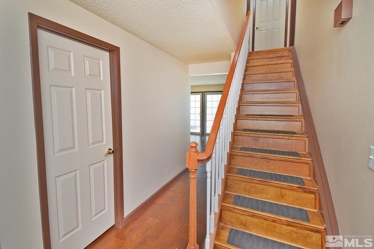 1113 Frontier Court Reno, NV 89503 - Photo 4 of 40 a view of entryway with wooden floor