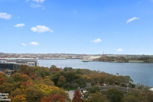 a view of city with tall buildings