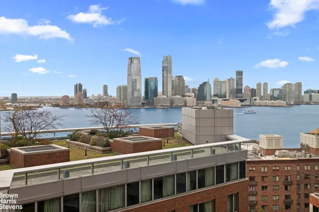 a view of city with tall buildings