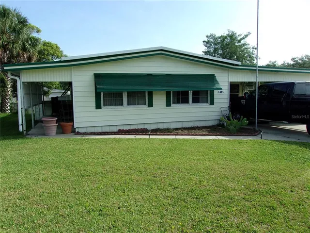 a front view of house with yard