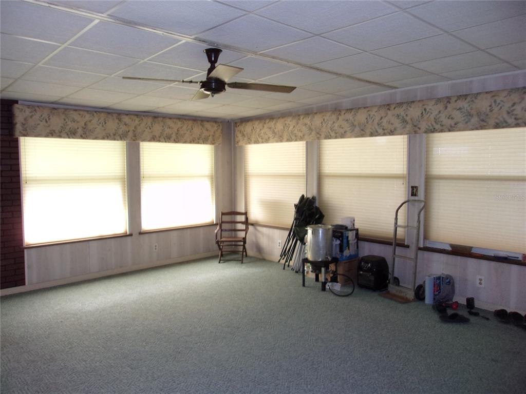 6485 Northeast 2nd Street Ocala, FL 34470 - Photo 13 of 55 a view of a room with gym equipment