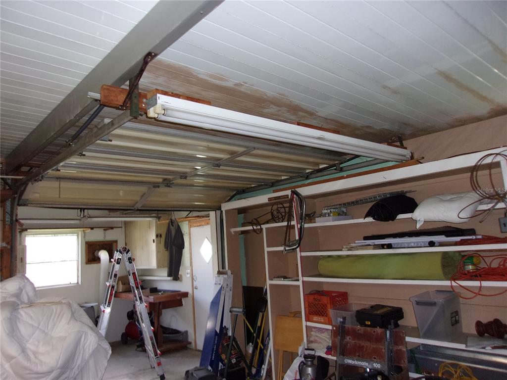 6485 Northeast 2nd Street Ocala, FL 34470 - Photo 15 of 55 a room with lots of storage and utility