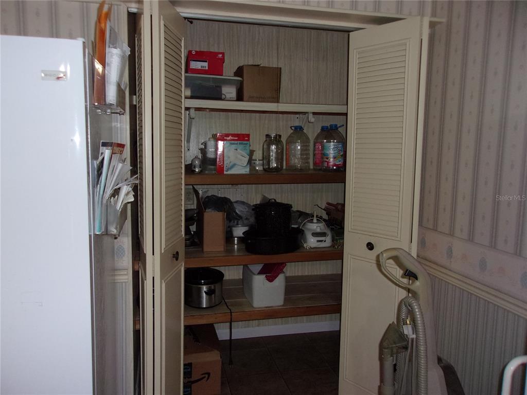 6485 Northeast 2nd Street Ocala, FL 34470 - Photo 19 of 55 a close view of water heater room