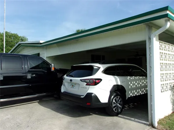 a car parked in front of a house