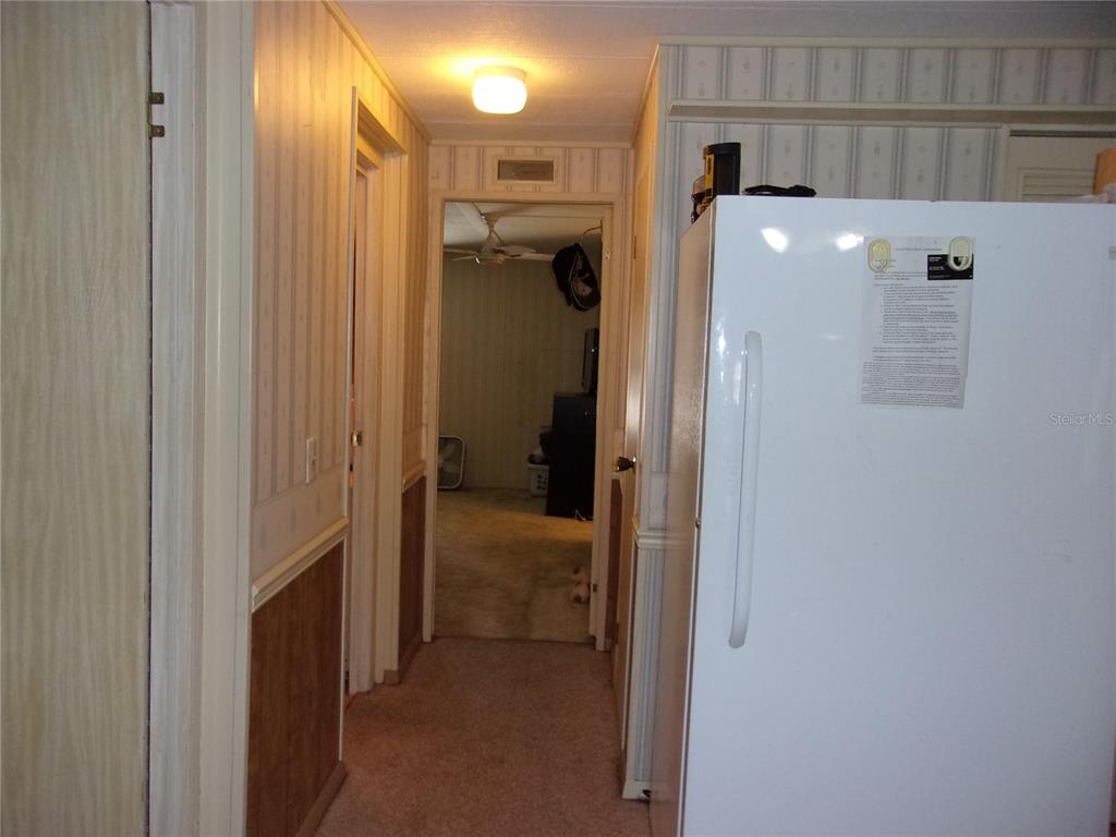 6485 Northeast 2nd Street Ocala, FL 34470 - Photo 25 of 55 a view of a hallway with a room