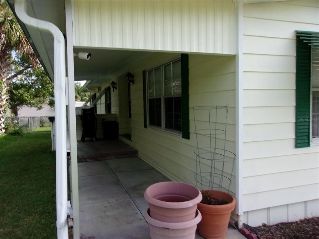 6485 Northeast 2nd Street Ocala, FL 34470 - Photo 3 of 55 a bathroom with a toilet and a shower