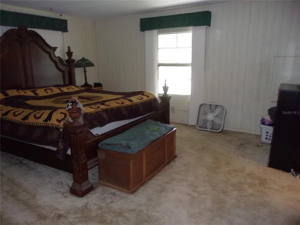 a bathroom with a shower and toilet