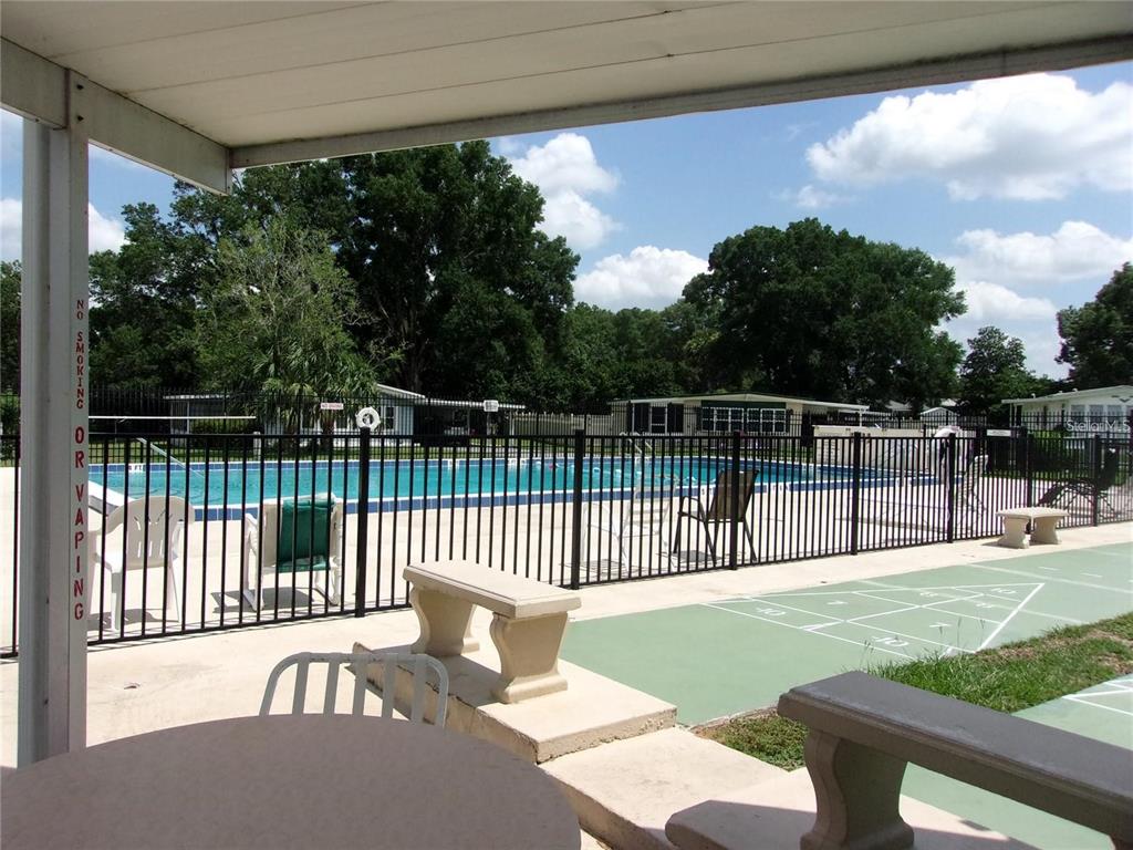 6485 Northeast 2nd Street Ocala, FL 34470 - Photo 46 of 55 a view of a bench in the roof deck