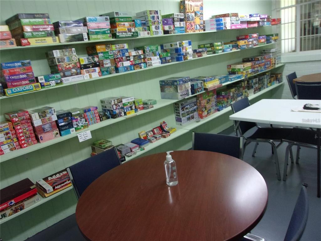 6485 Northeast 2nd Street Ocala, FL 34470 - Photo 54 of 55 a view of a dining room with shelves
