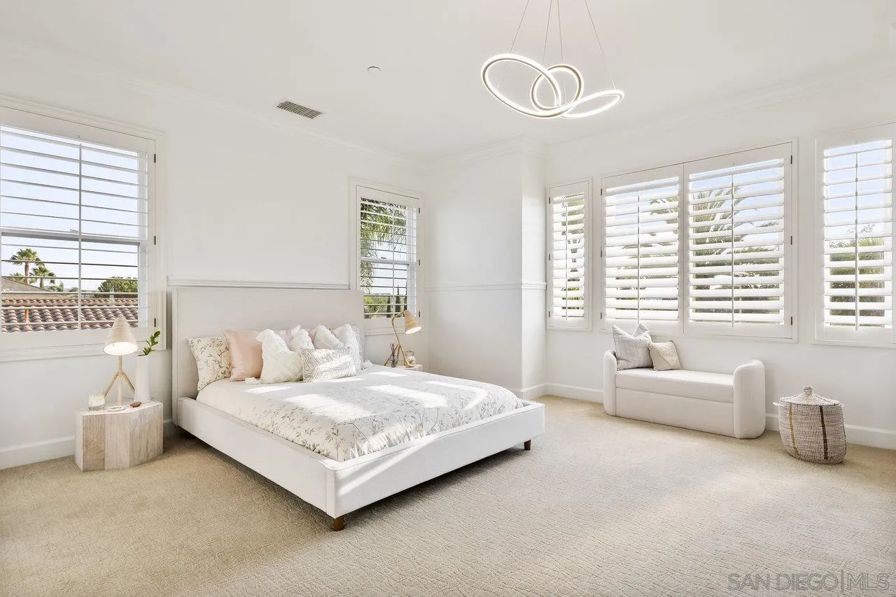 17133 Castello Circle San Diego, CA 92127 - Photo 13 of 48 a bedroom with a bed and a couch