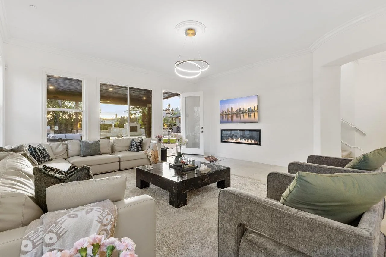 17133 Castello Circle San Diego, CA 92127 - Photo 23 of 48 a living room with furniture and a large window