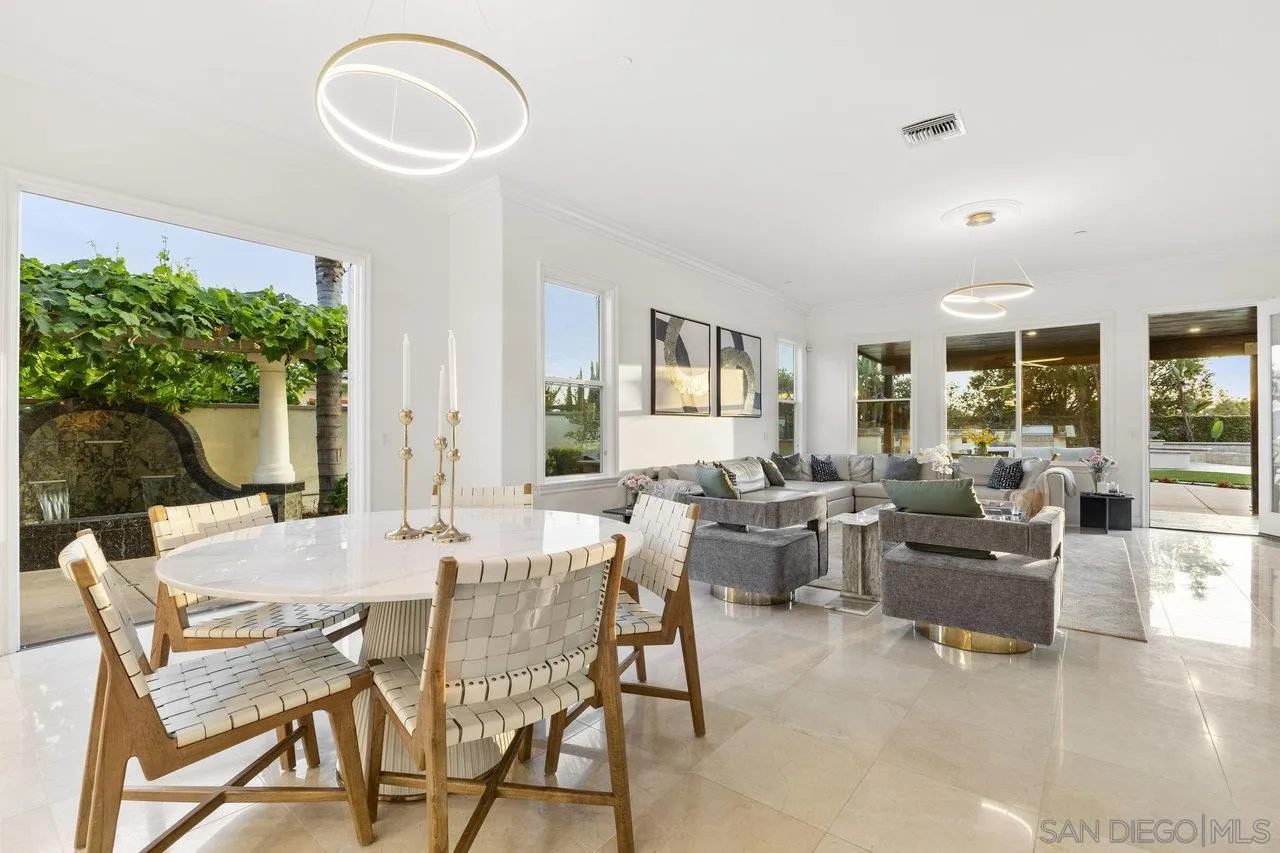 17133 Castello Circle San Diego, CA 92127 - Photo 26 of 48 a view of a dining room with furniture and a large window