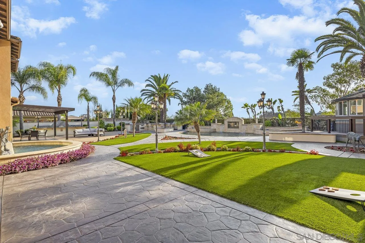 17133 Castello Circle San Diego, CA 92127 - Photo 33 of 48 a view of a swimming pool with an outdoor seating
