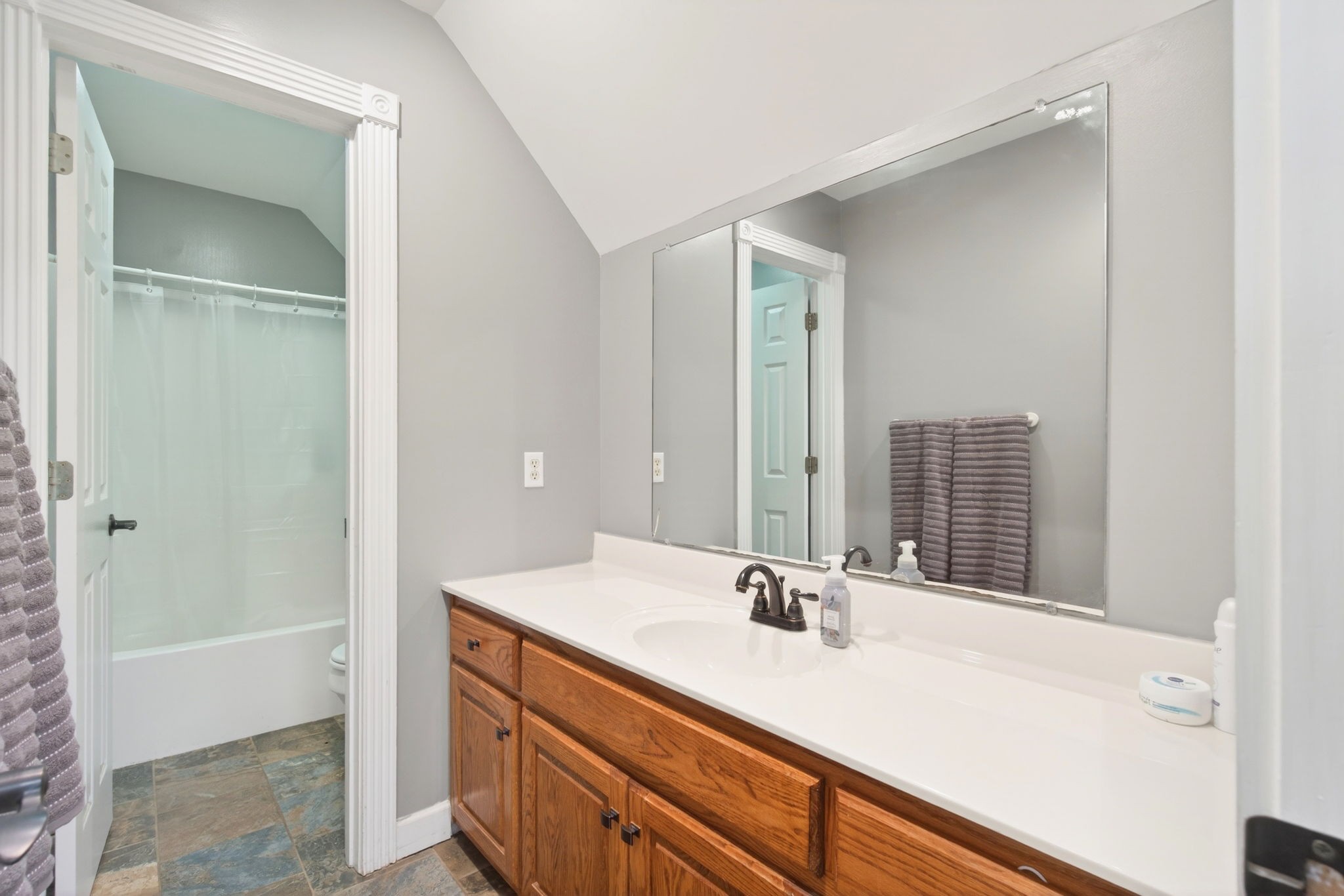 3432 WJ Robinson Road Cookeville, TN 38506 - Photo 15 of 32 a bathroom with a sink and a mirror