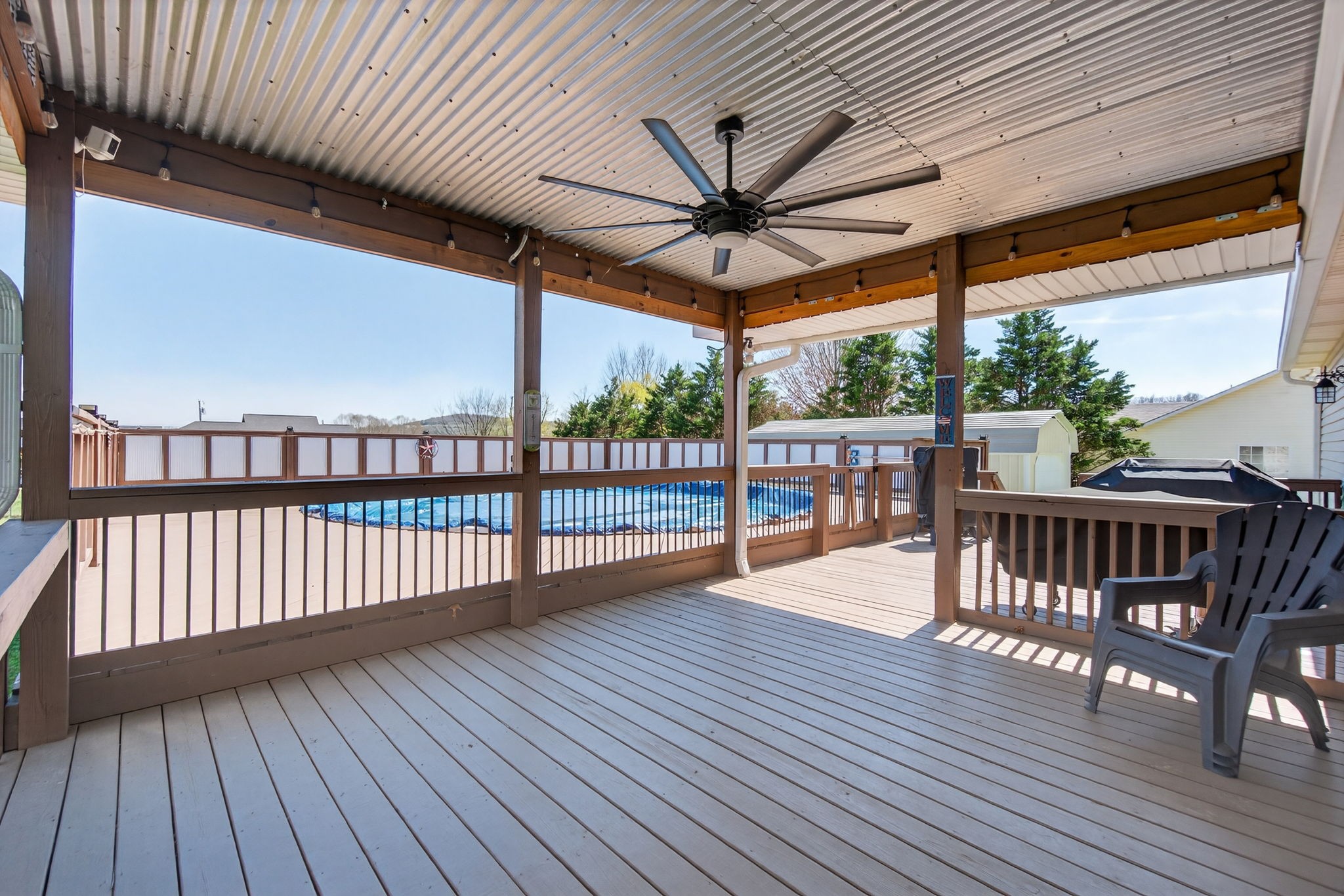 3432 WJ Robinson Road Cookeville, TN 38506 - Photo 21 of 32 a view of a porch with wooden floor