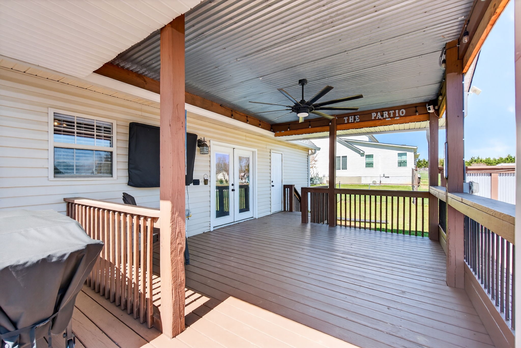 3432 WJ Robinson Road Cookeville, TN 38506 - Photo 22 of 32 a view of a porch with wooden floor
