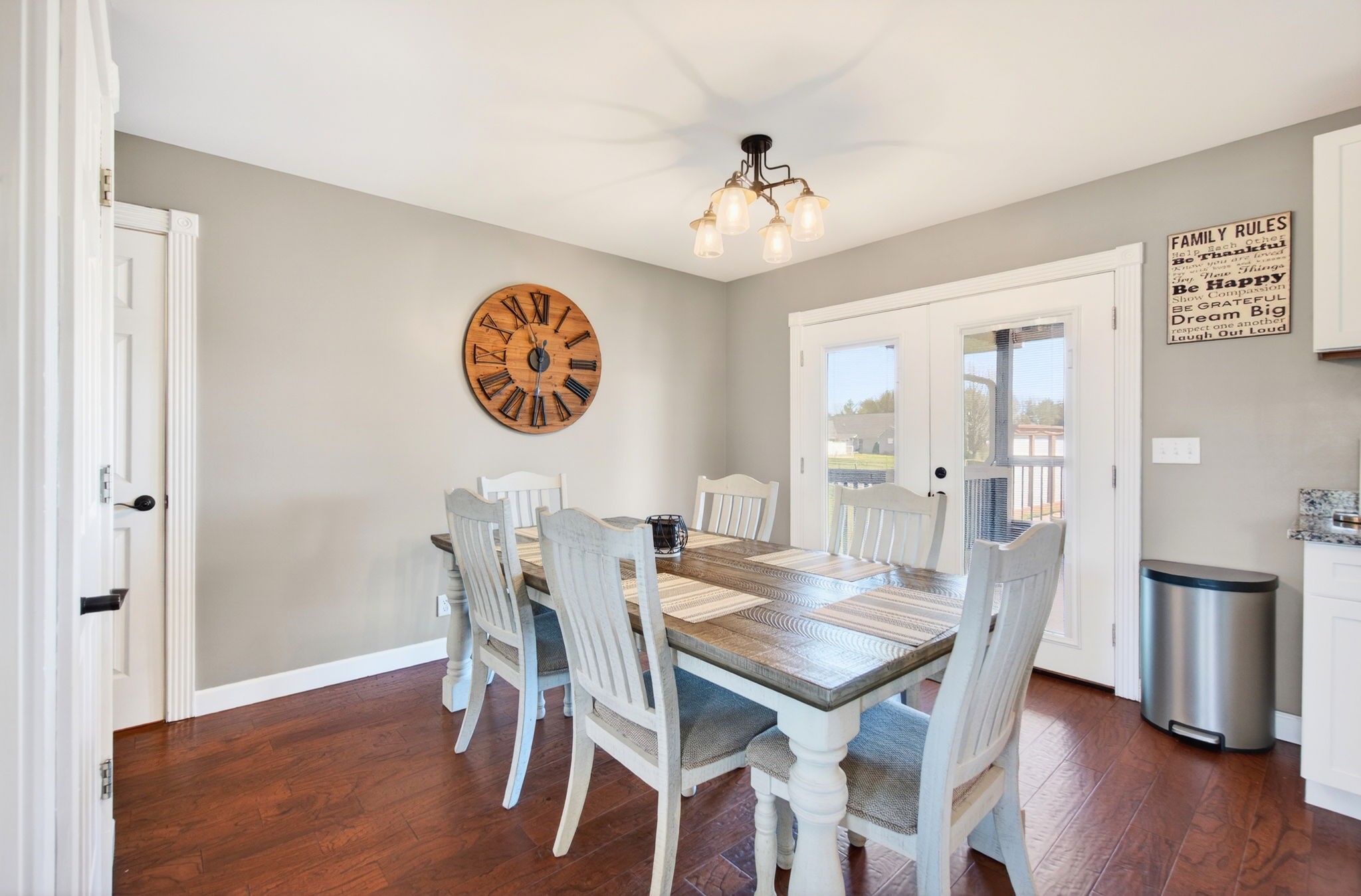 3432 WJ Robinson Road Cookeville, TN 38506 - Photo 6 of 32 a view of a dining room with furniture and wooden floor