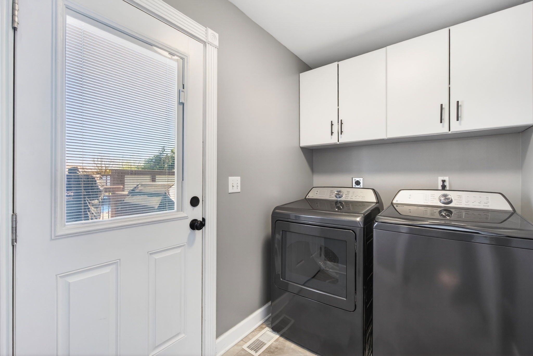 3432 WJ Robinson Road Cookeville, TN 38506 - Photo 7 of 32 a utility room with dryer and washer
