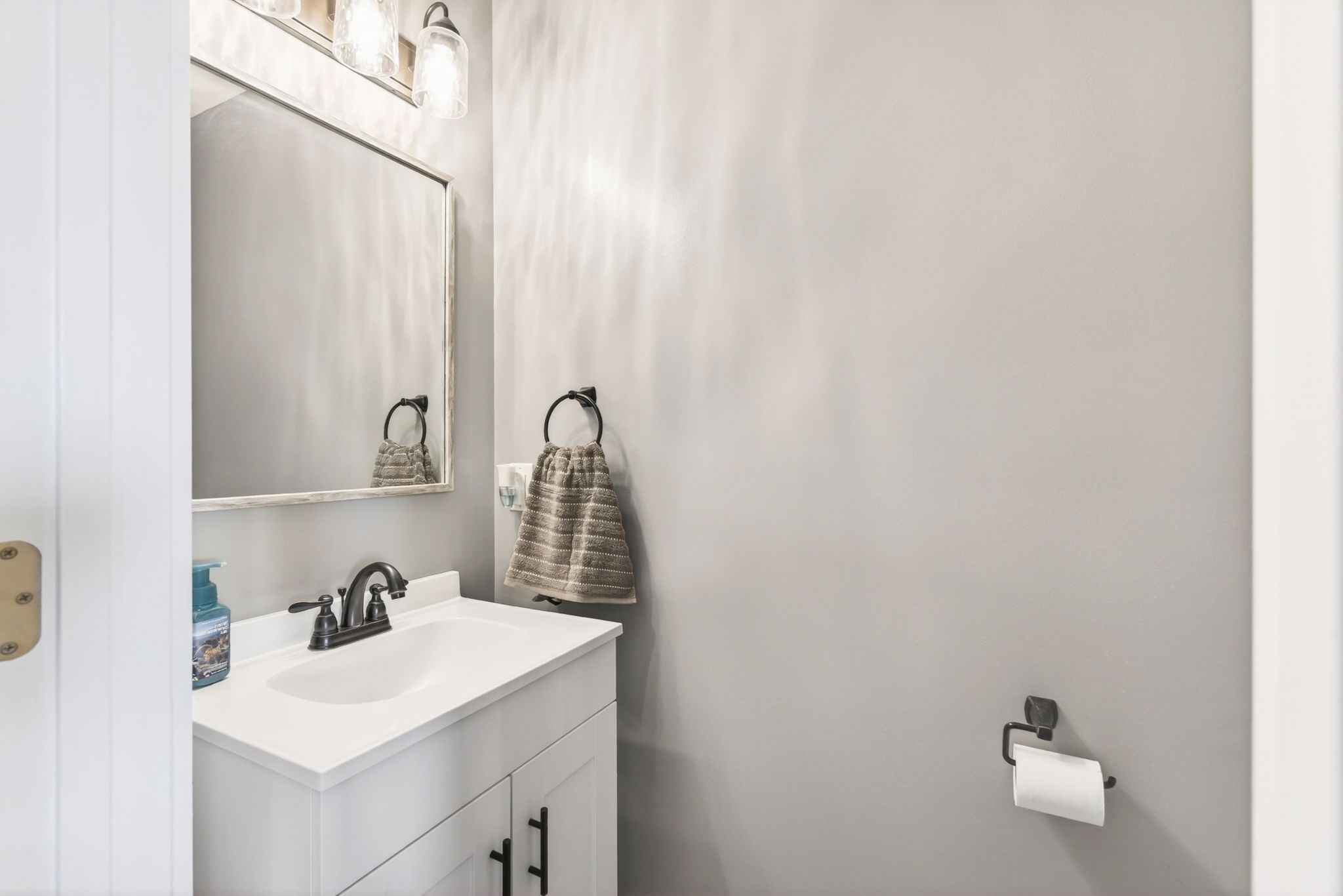 3432 WJ Robinson Road Cookeville, TN 38506 - Photo 8 of 32 a bathroom with a sink and a vanity