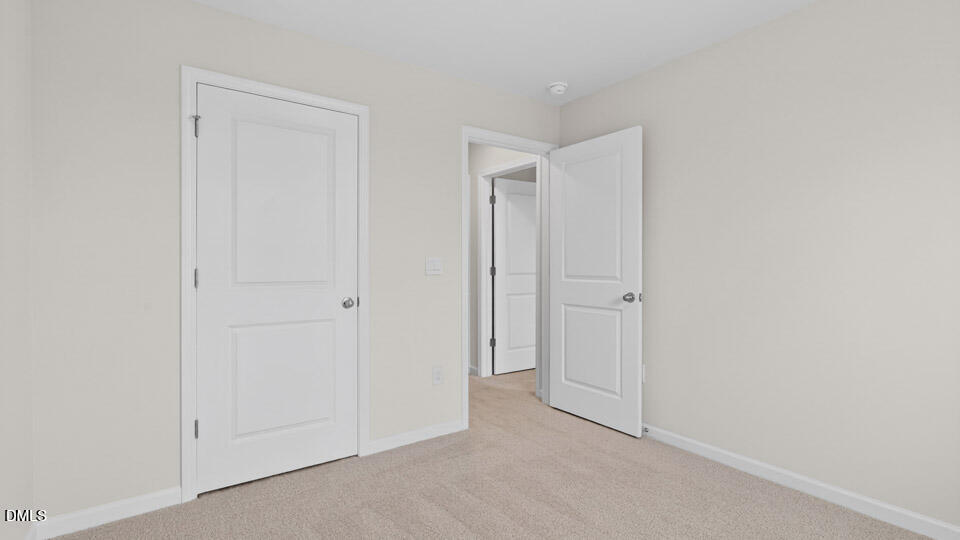 16 Red Clover Drive Angier, NC 27501 - Photo 18 of 36 a view of an empty room