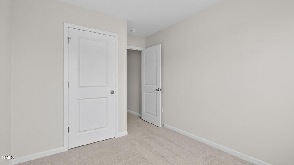 16 Red Clover Drive Angier, NC 27501 - Photo 23 of 36 a view of an empty room