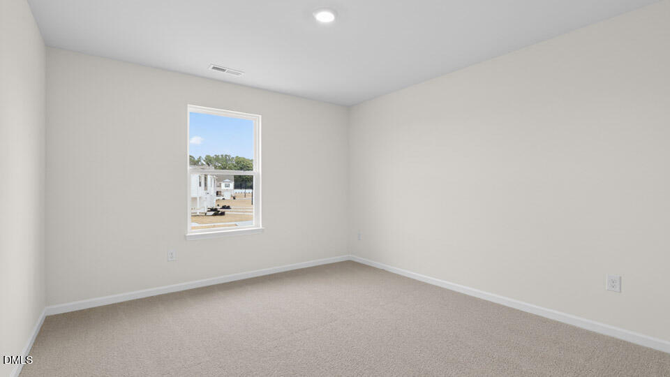 16 Red Clover Drive Angier, NC 27501 - Photo 24 of 36 an empty room with a window
