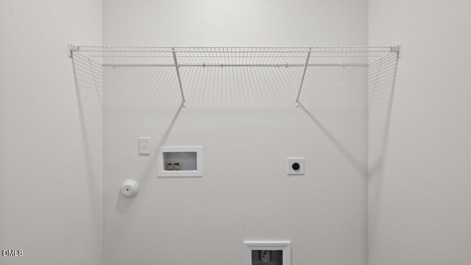 16 Red Clover Drive Angier, NC 27501 - Photo 28 of 36 a bathroom with a shower and vanity