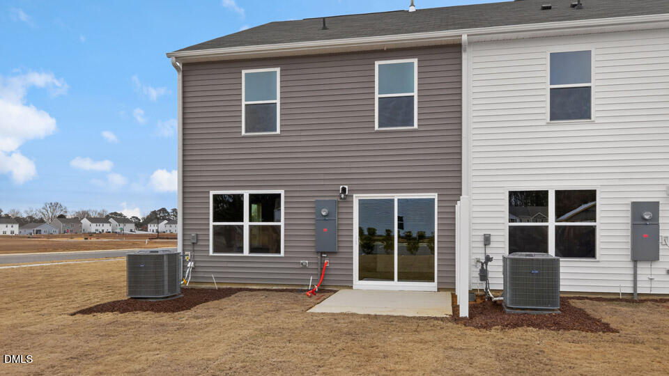 16 Red Clover Drive Angier, NC 27501 - Photo 34 of 36 a front view of a house with a ocean view