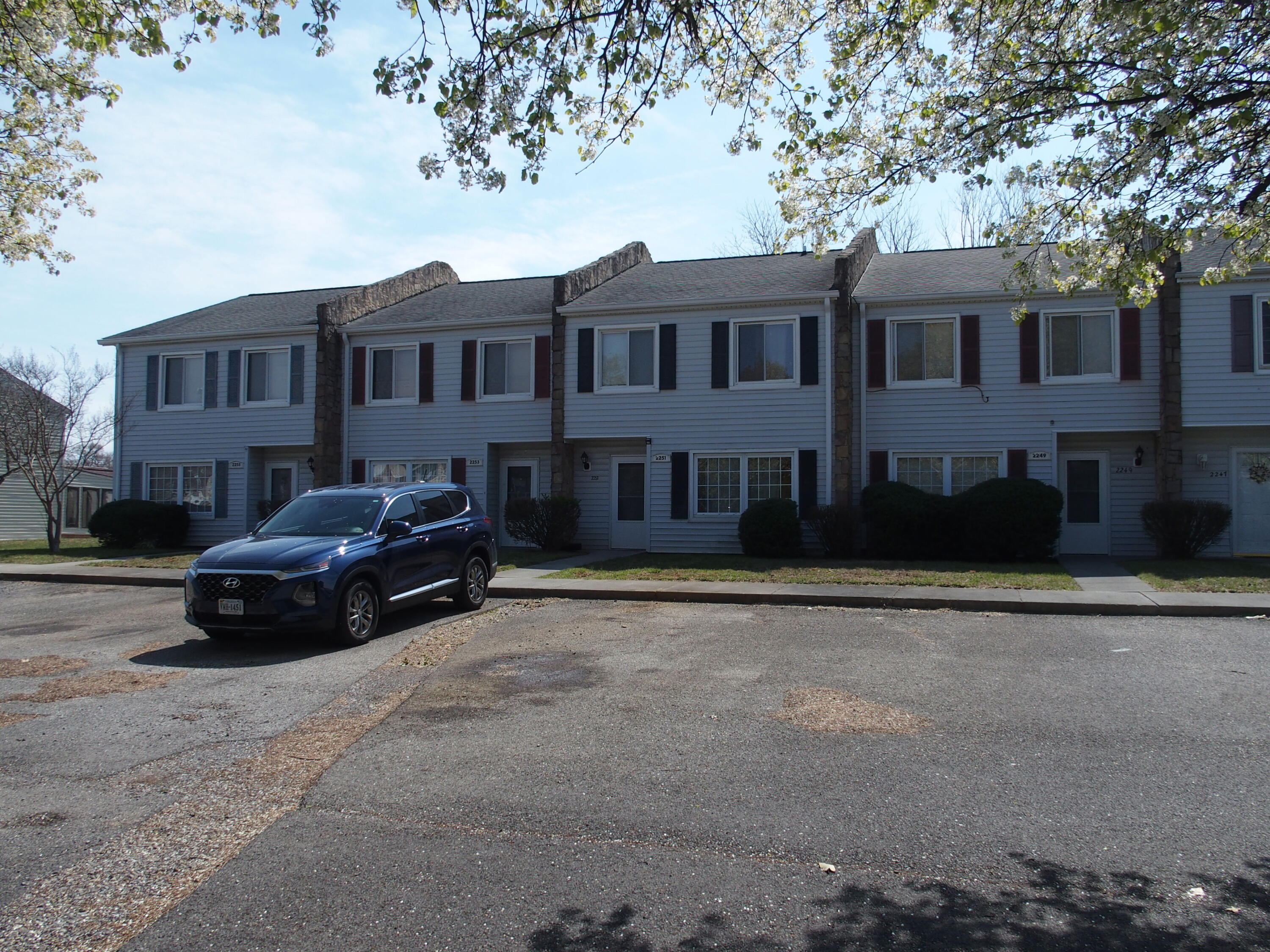 2249 Ranch Road Northwest, Unit 2255 Roanoke, VA 24017 - Photo 2 of 7 a car parked in front of a house