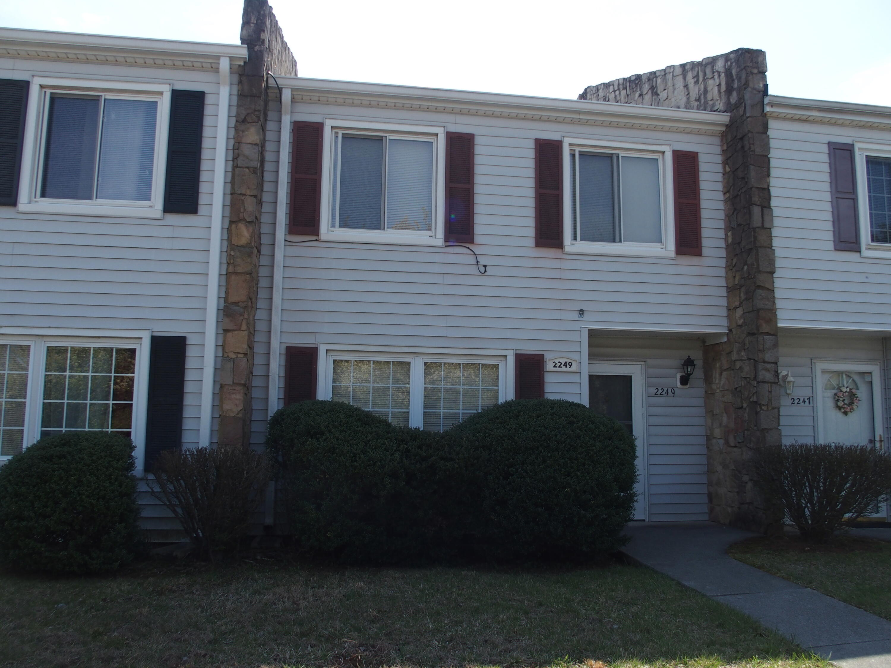 2249 Ranch Road Northwest, Unit 2255 Roanoke, VA 24017 - Photo 6 of 7 a front view of a house with a yard