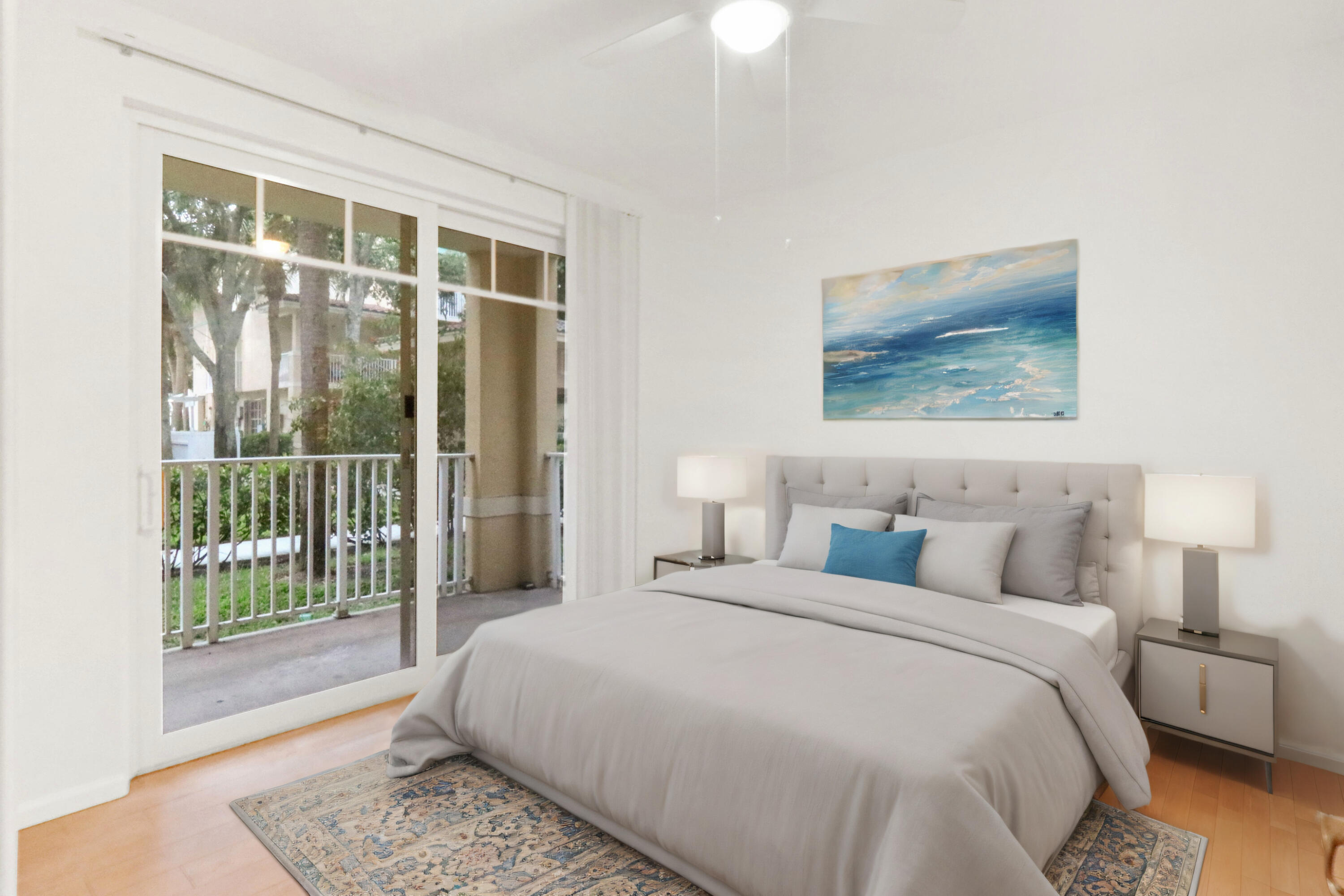 4784 Central Boulevard, Unit 10 Jupiter, FL 33458 - Photo 16 of 29 a bedroom with a bed and a window