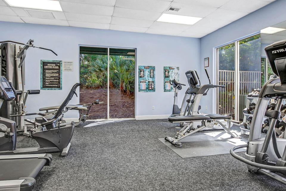 4784 Central Boulevard, Unit 10 Jupiter, FL 33458 - Photo 27 of 29 a view of a room with gym equipment