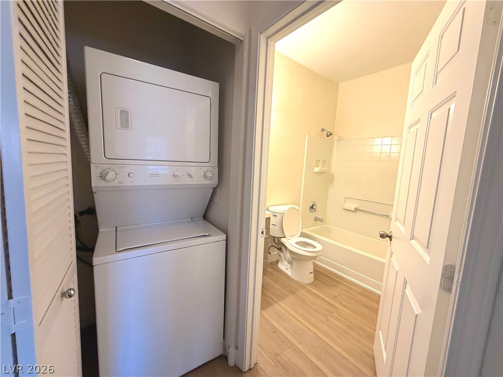 4730 East Craig Road, Unit 1164 Las Vegas, NV 89115 - Photo 6 of 14 A dedicated laundry closet with a stacked washer and dryer offers supreme convenience next to a tidy bathroom.