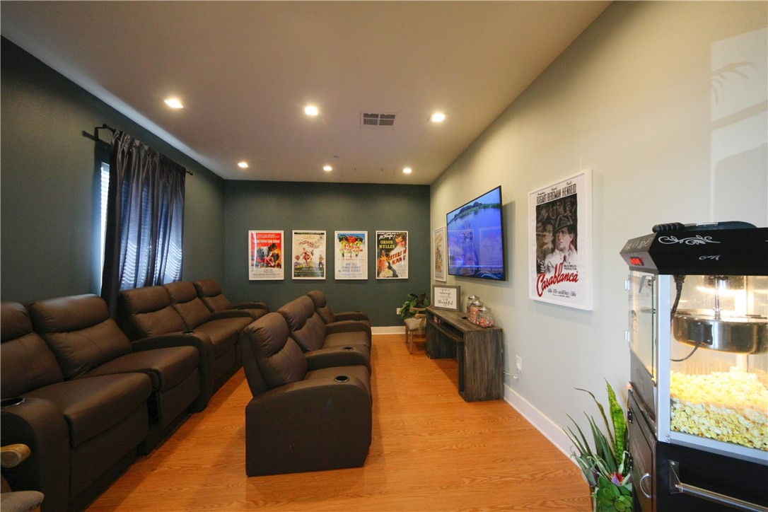 2400 Louis Henna Boulevard, Unit 103 Round Rock, TX 78664 - Photo 17 of 22 a living room with furniture and a flat screen tv