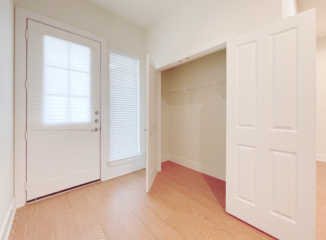 2400 Louis Henna Boulevard, Unit 103 Round Rock, TX 78664 - Photo 2 of 22 an empty room with windows